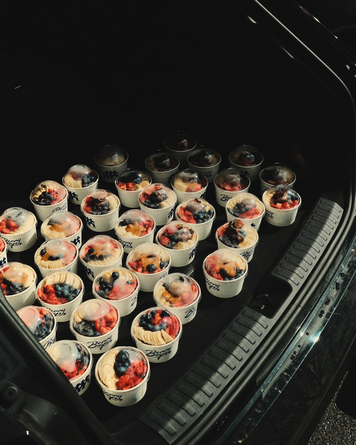 A car boot loaded with Berry Boys bowls, ready for an event